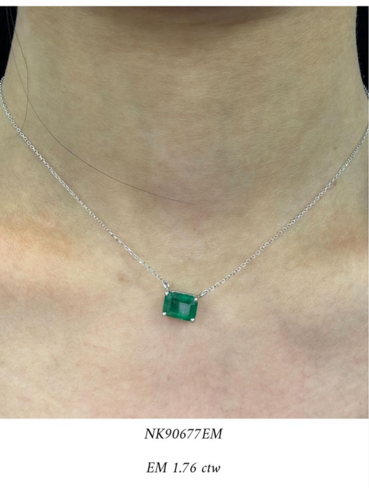 14k white gold necklace with emerald